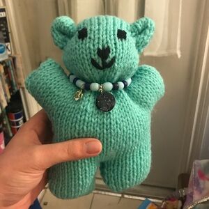 Handmade teddy bear and bracelet